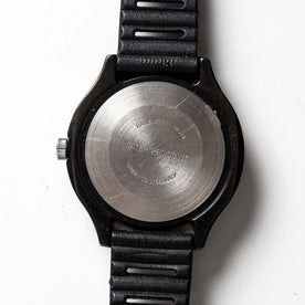 flatlay of the 1977 Timex Black Max, shown from the back