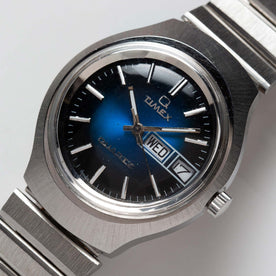 flatlay of the 1977 Timex Blue Dial Q Quartz, shown close up