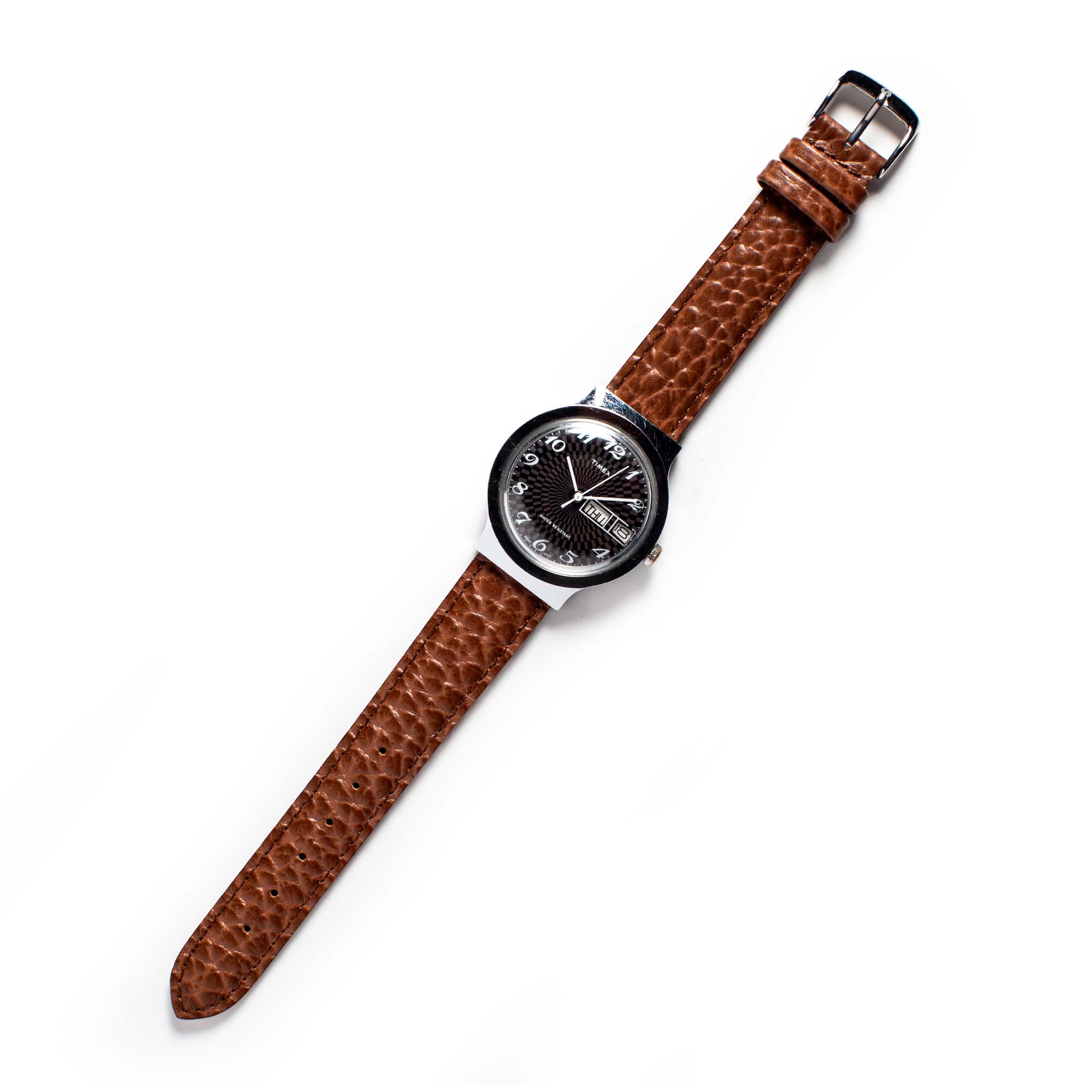 flatlay of the 1977 Timex Marlin, Accessories by Taylor Stitch