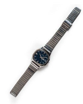 flatlay of the 1981 Timex Viscount, Accessories by Taylor Stitch