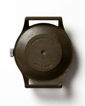 flatlay of the 1991 Timex Camper, shown without straps, Accessories by Taylor Stitch