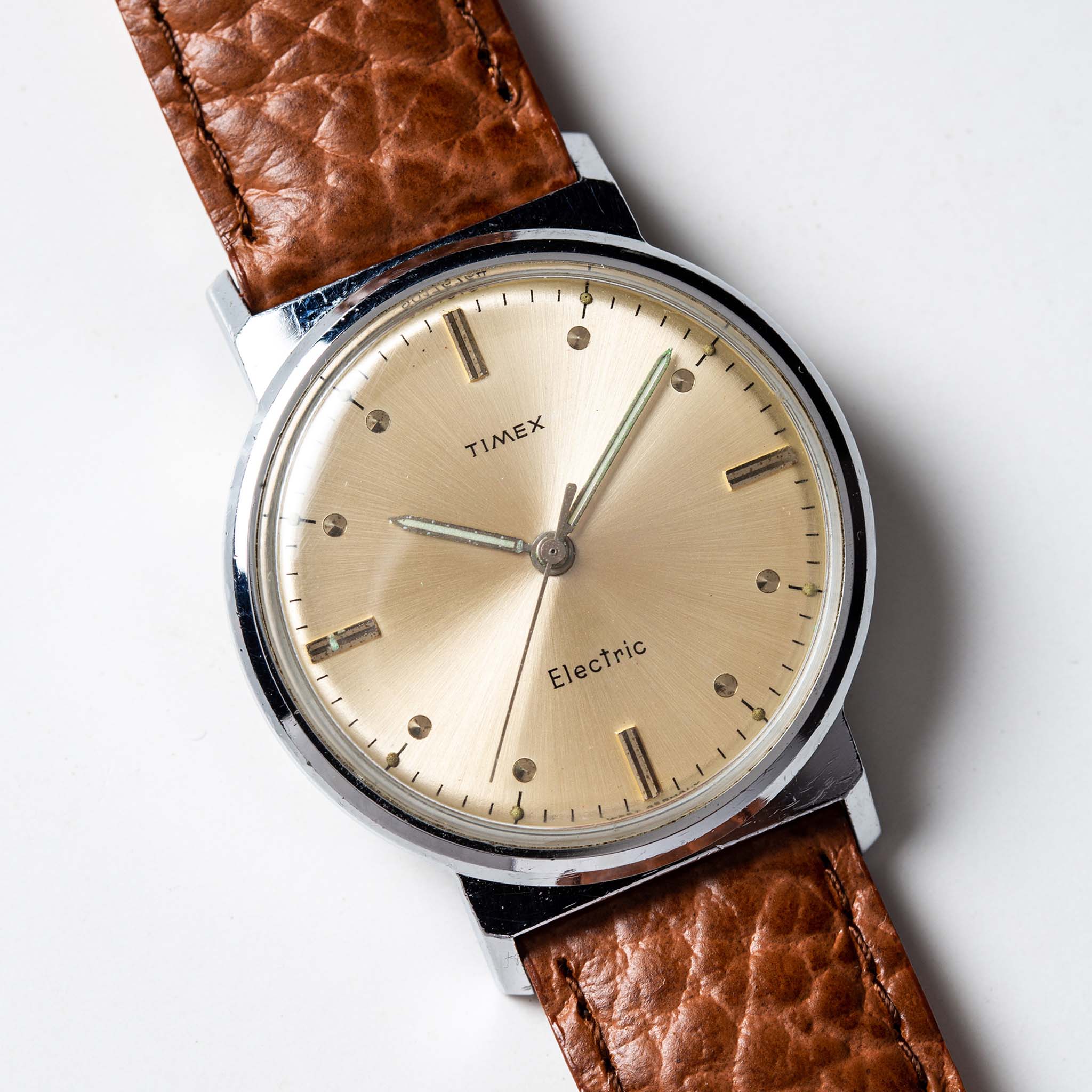 material shot of the watchface of The 1964 Timex Electric, Accessories by Taylor Stitch