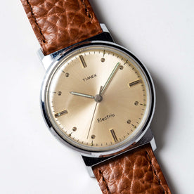 material shot of the watchface of The 1964 Timex Electric