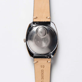 flatlay of 1975 Timex Electric Dynabeat "Rotary", from the back