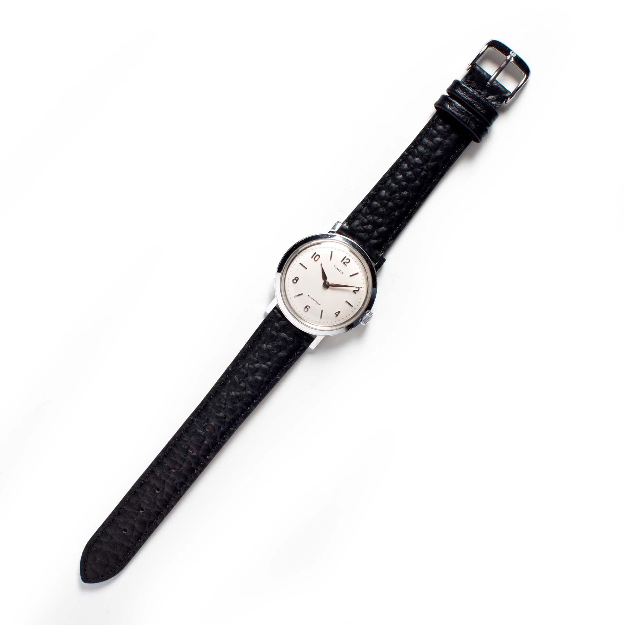 flatlay of The 1960 Timex Marlin Aluminum, Accessories by Taylor Stitch