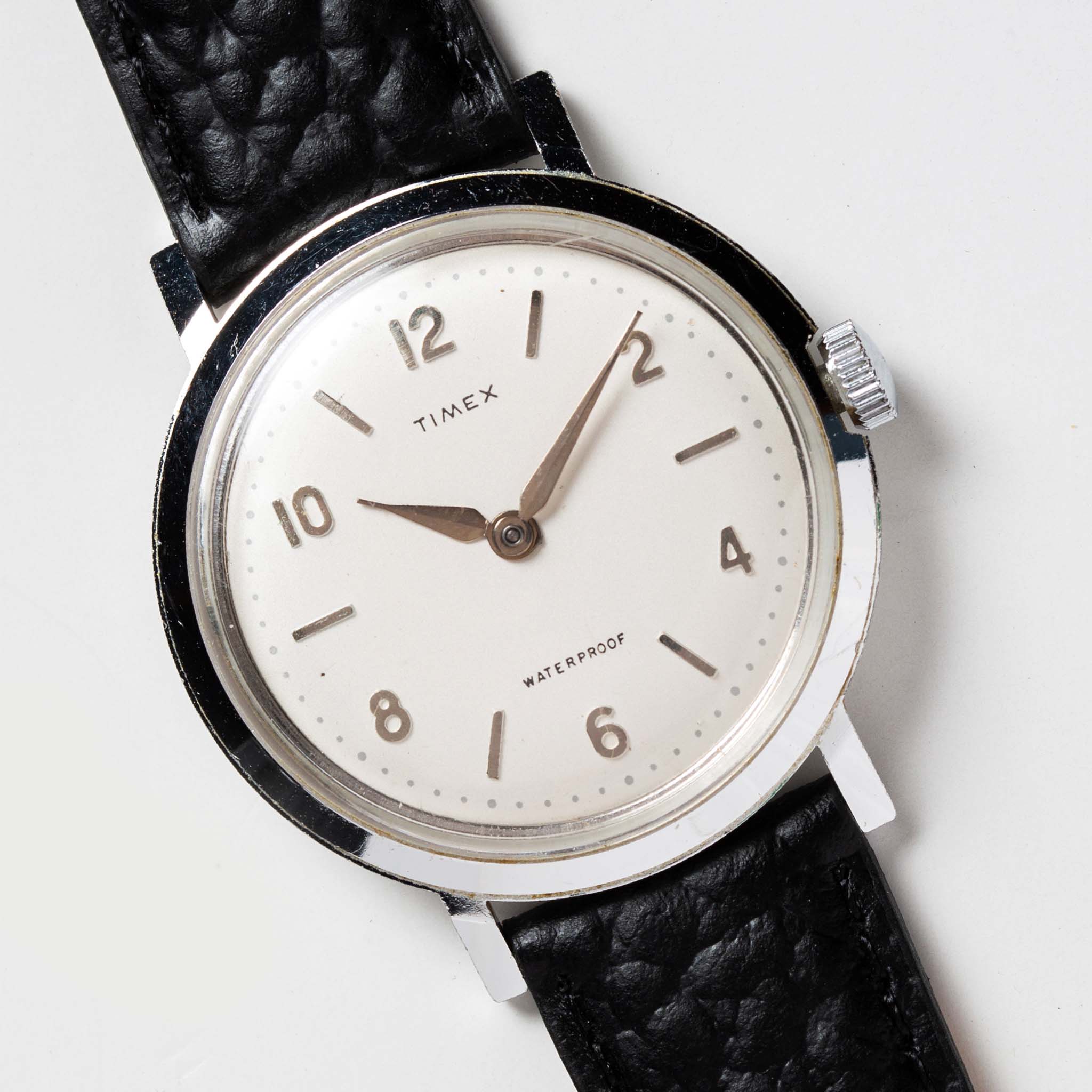material shot of the watchface of The 1960 Timex Marlin Aluminum, Accessories by Taylor Stitch