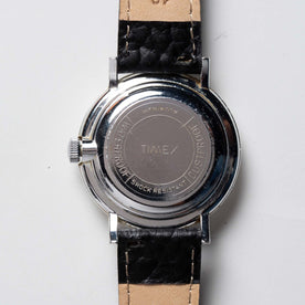 material shot of the back of The 1960 Timex Marlin Aluminum