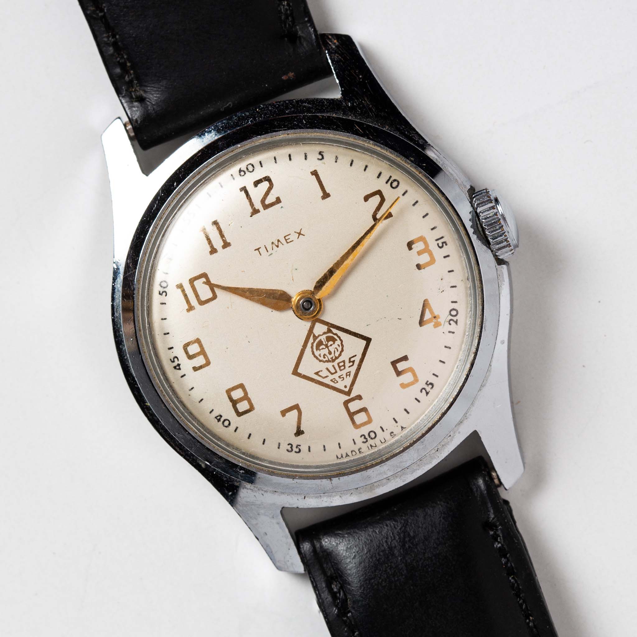 editorial image of 1957 Timex Marlin Cub Scout watch face, Accessories by Taylor Stitch