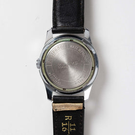editorial image of the back of 1957 Timex Marlin Cub Scout
