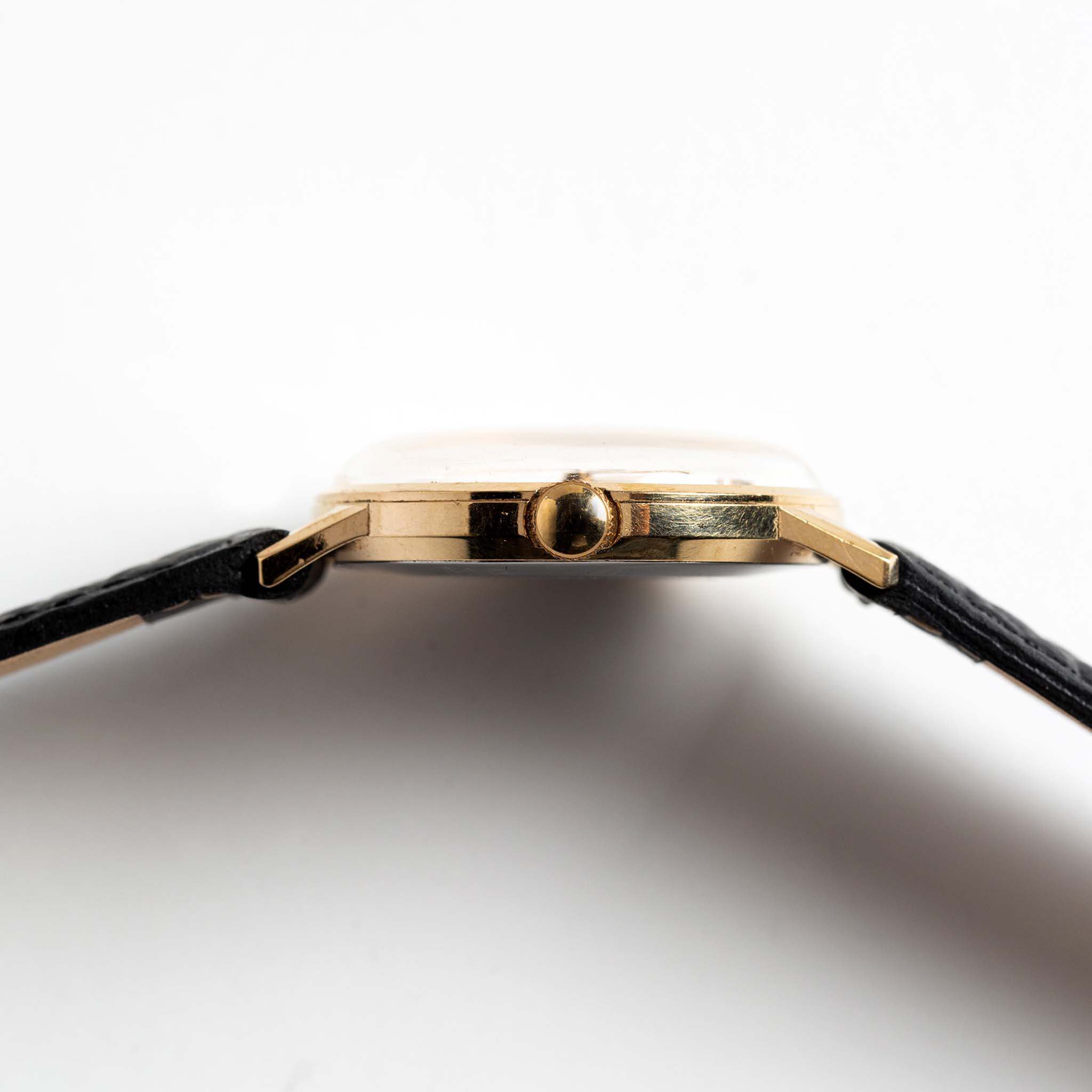 material shot of the side of The 1975 Timex Marlin "Dot Dash", Accessories by Taylor Stitch