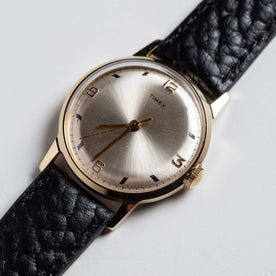 material shot of the watchface of The 1970 Timex Mercury "MLK"