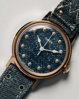 flatlay of the 1978 Timex Mercury "Denim", shown close up, Accessories by Taylor Stitch
