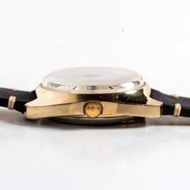 flatlay of the 1978 Timex Q Quartz, shown from the side
