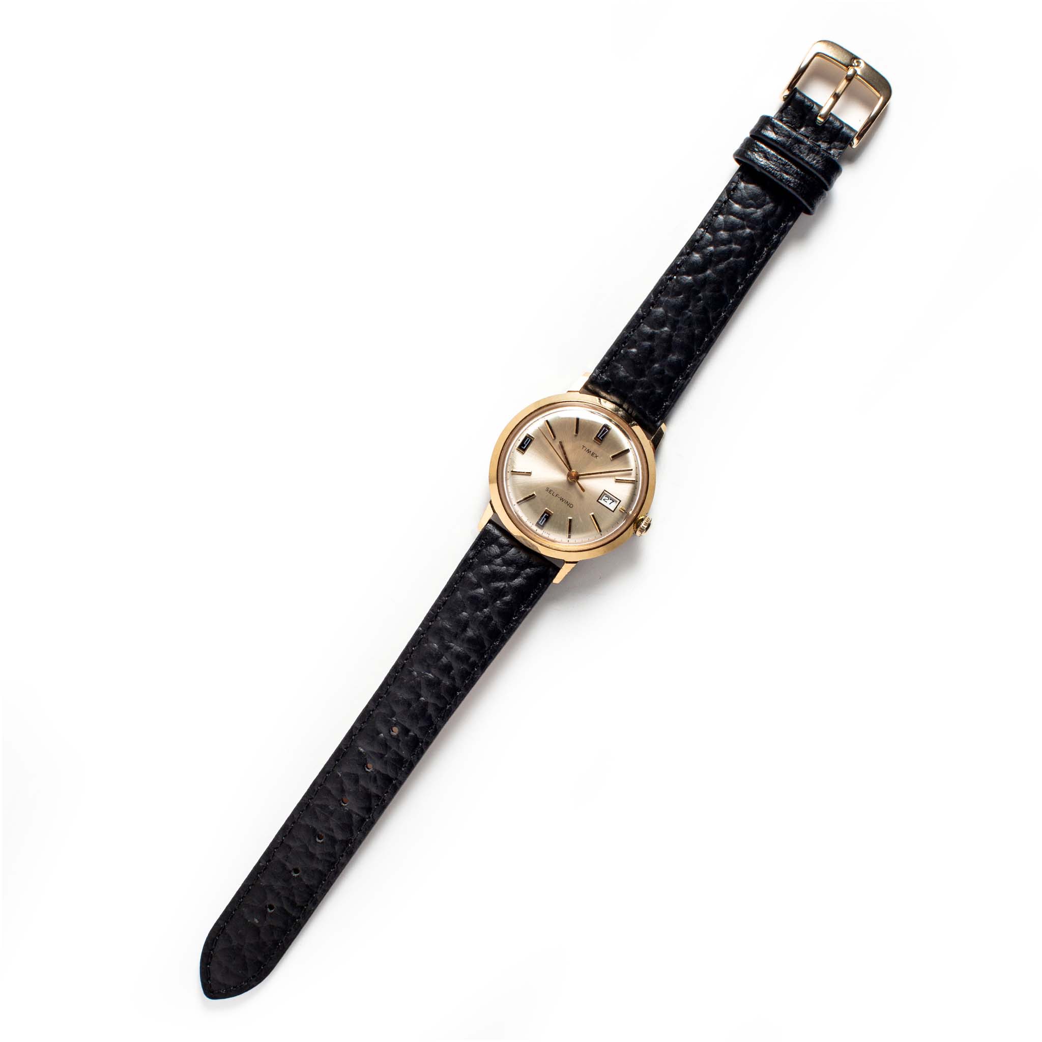 Flat lay of Timex 1970 Viscount, Accessories by Taylor Stitch