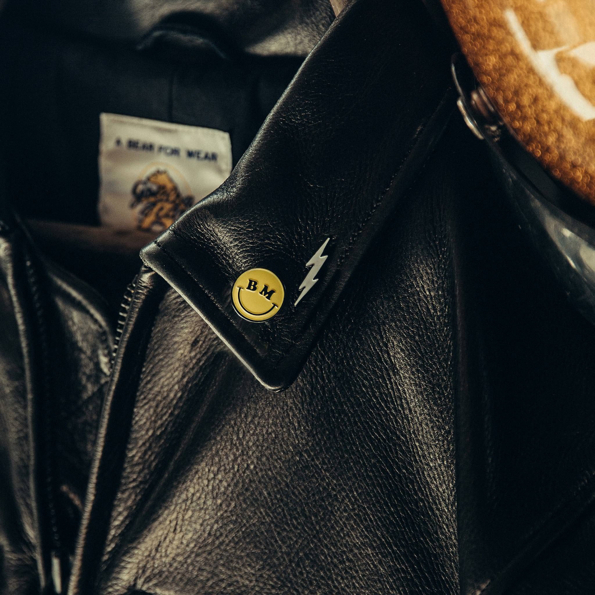 material shot of the bolt enamel pin on jacket, Accessories by Taylor Stitch