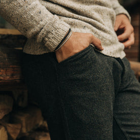 fit model wearing The Camp Pant in Dark Moss Wool, hand in pocket