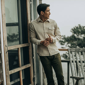 fit model wearing The Cash Shirt in Natural Sashiko, looking right on deck