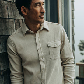 fit model wearing The Cash Shirt in Natural Sashiko, cropped shot forehead down
