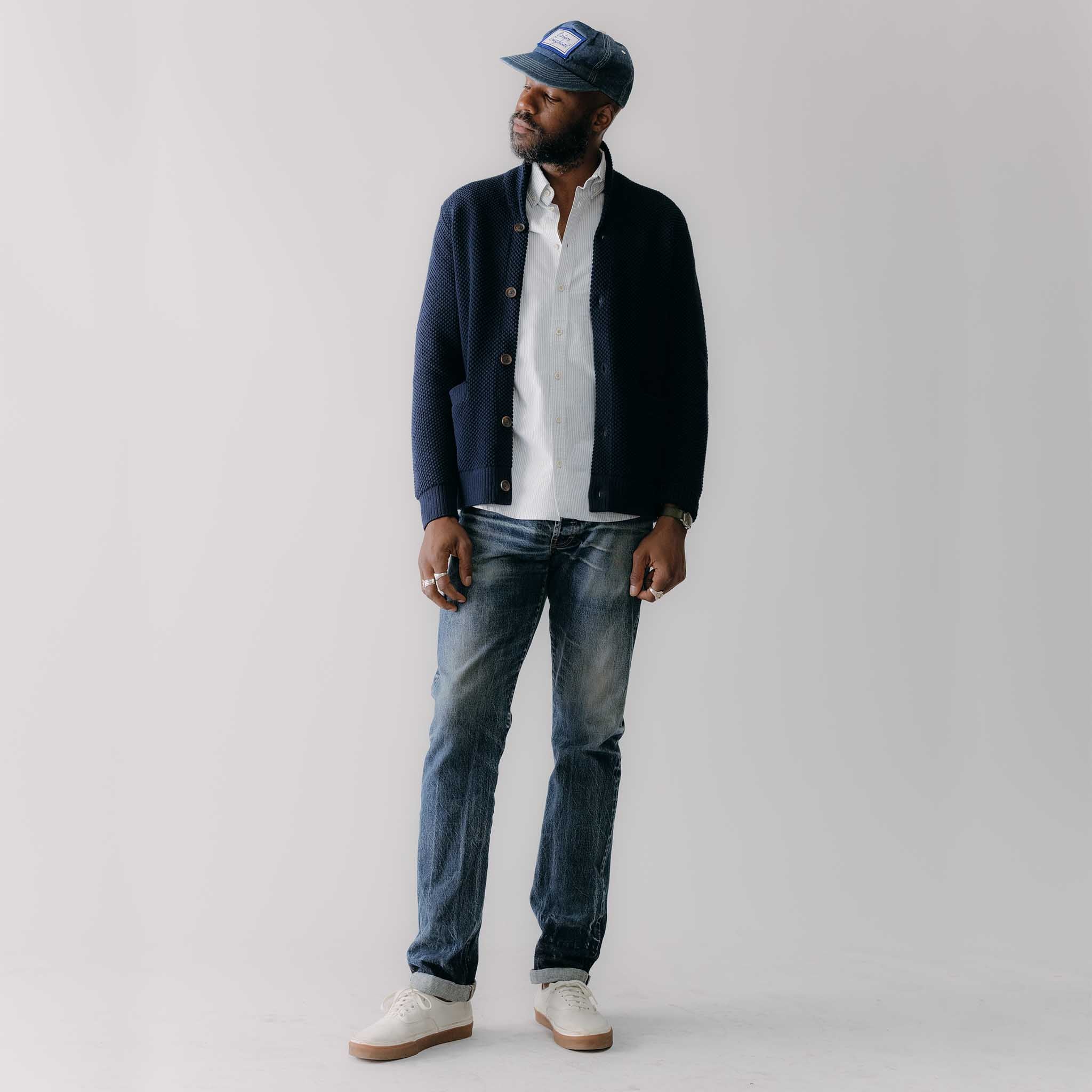 fit model rocking the The Crawford Sweater in Navy in a car, Knits by Taylor Stitch