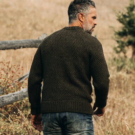 fit model wearing The Fisherman Sweater in Loden, back shot