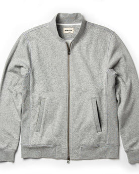 flatlay of The Heavy Bag Bomber in Heather Grey Fleece from the front zipped up, Knits by Taylor Stitch