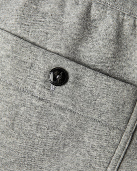 material shot of back pocket and horn button closeup of The Heavy Bag Pant in Heather Grey Fleece, Pants by Taylor Stitch