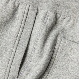 material shot of The Heavy Bag Pant in Heather Grey Fleece's side seam showing diversity of knit stitching and ribbing details throughout