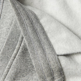 material shot of waistband stitching and inside fleece detail contrasted with outer exterior fabric of The Heavy Bag Short in Heather Grey Fleece