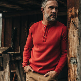 our fit model wearing The Heavy Bag Waffle Henley in Cardinal—LOOKING RIGHT