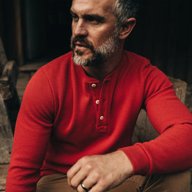 The Heavy Bag Waffle Henley in Cardinal—looking left, Knits by Taylor Stitch