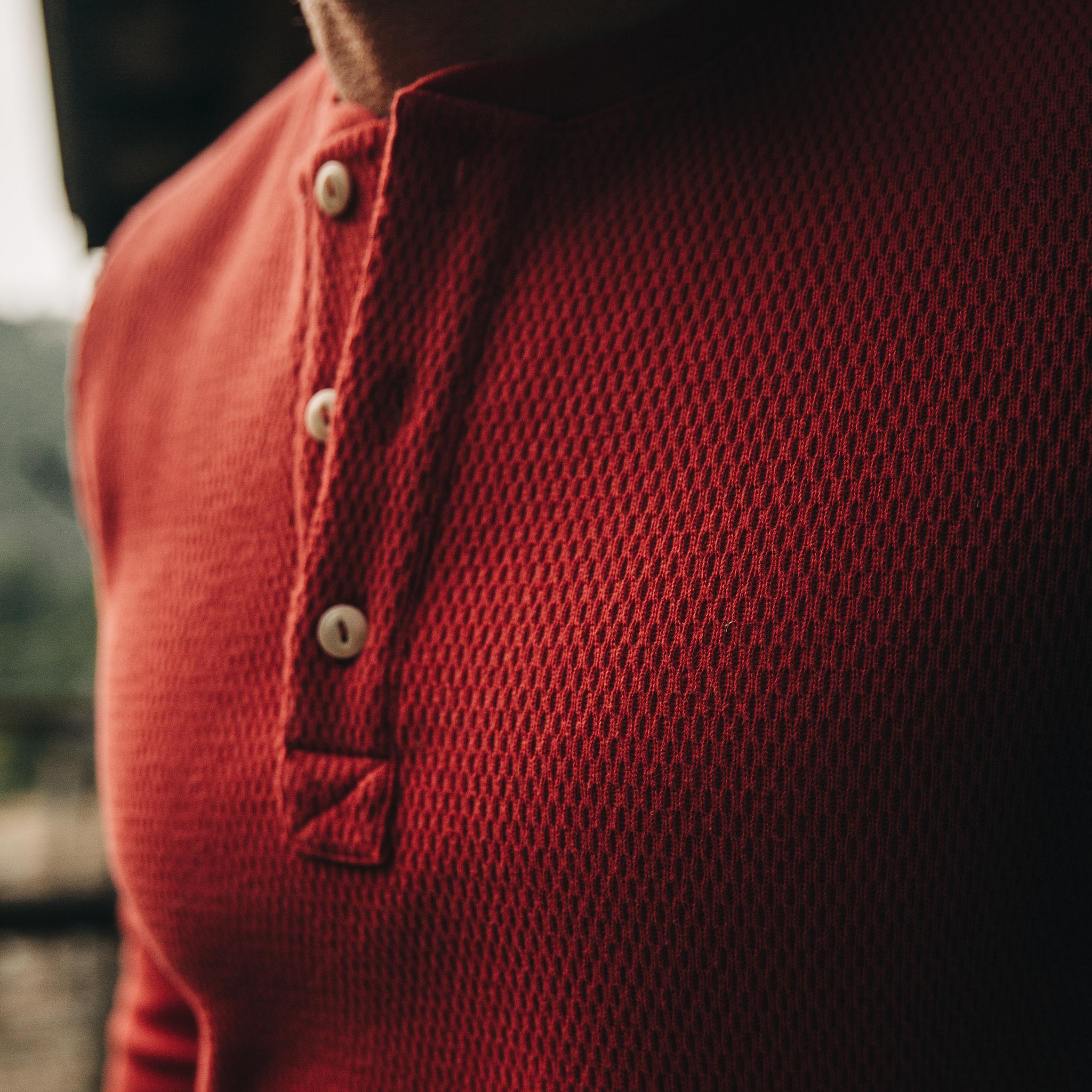 The Heavy Bag Waffle Henley in Cardinal—cropped shot of chest, Knits by Taylor Stitch