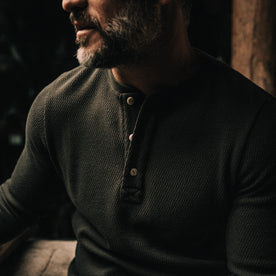 our fit model wearing The Heavy Bag Waffle Henley in Olive—cropped shot of chest