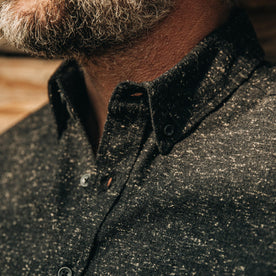 our fit model wearing The Jack in Coal Donegal—cropped shot of chest