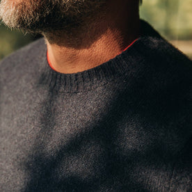 our fit model wearing The Lodge Sweater in Navy—cropped shot of collar