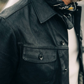 fit model wearing The Long Haul Jacket in Black Over-dye Selvage, shoulder shot