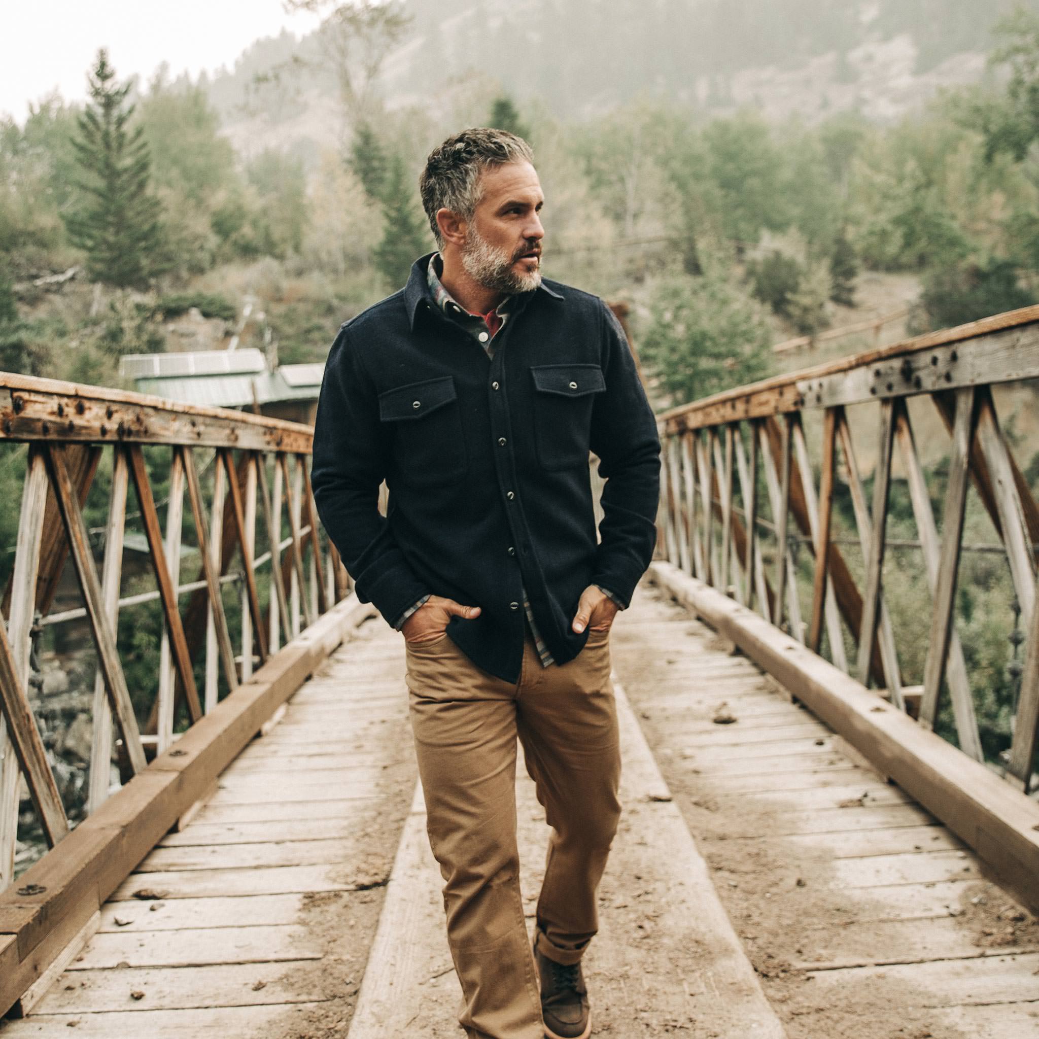 The Maritime Shirt Jacket in Deep Navy—walking on bridge, Wovens by Taylor Stitch