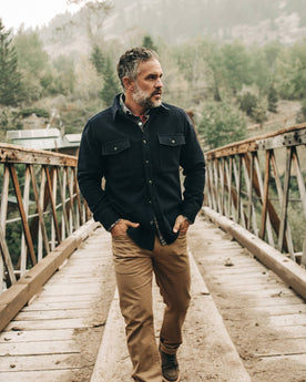 The Maritime Shirt Jacket in Deep Navy—walking on bridge, Wovens by Taylor Stitch