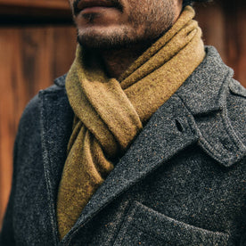 our fit model wearing The Scarf in Ochre Baby Yak—under Gibson
