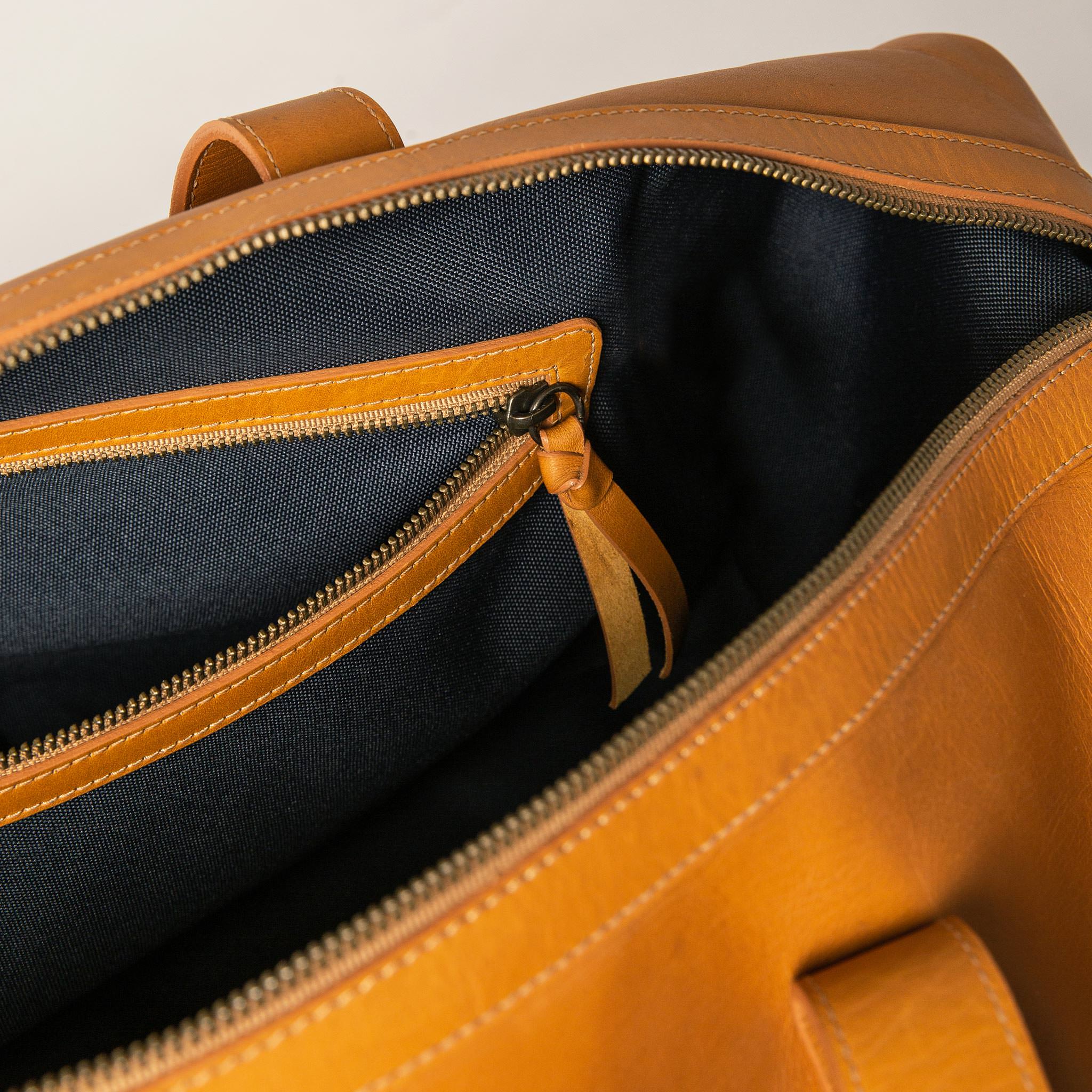 studio shot of interior zipper, Accessories by Taylor Stitch