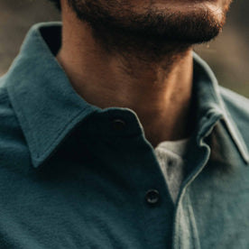 fit model wearing The Yosemite Shirt in Deep Ocean—cropped collar shot