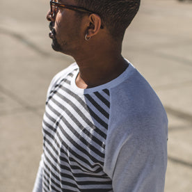 Our fit model wearing a stripe baseball tee