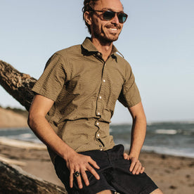 On a windy day our fit model wears a Taylor Stitch shirt