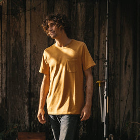 Our fit model wearing The Heavy Bag Tee in Canary.