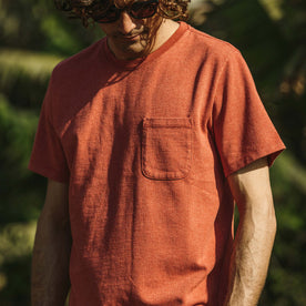 Our fit model wearing The Heavy Bag Tee in Washed Rust.