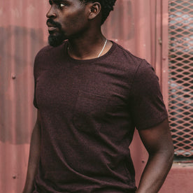 The fit model wearing our burgundy heavy bag tee