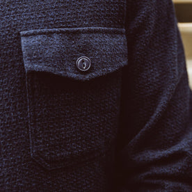 Up close of the utility shirt on the fit model