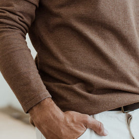 The fit model wearing The Heavy Bag Henley in Fatigue Brown by Taylor Stitch.