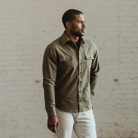 Our fit model wearing The Yosemite Shirt in Dusty Army by Taylor Stitch.