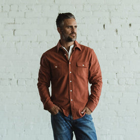 Our fit model wearing The Yosemite Shirt in Dusty Red by Taylor Stitch.