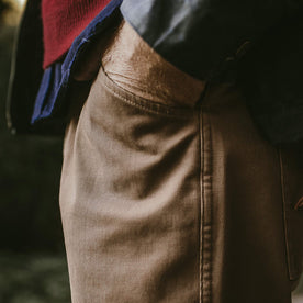 Detail shot of the cord camp pants worn by our fit model